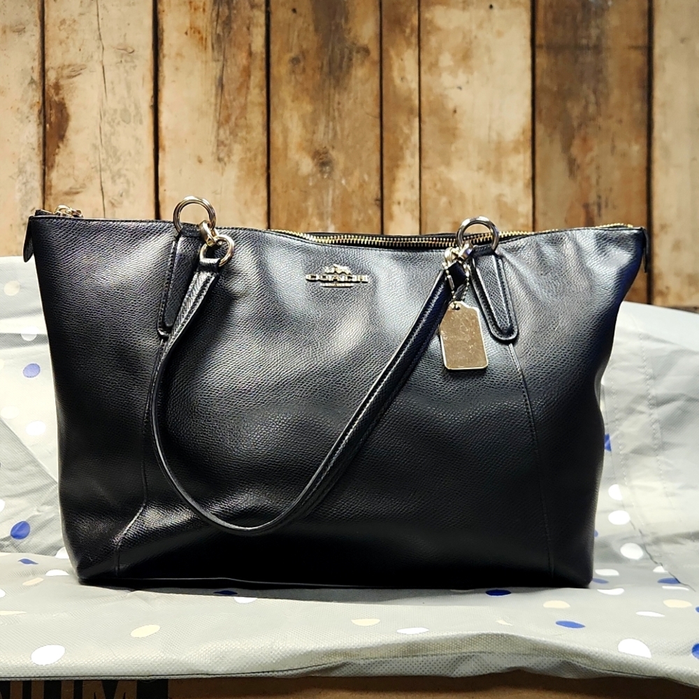 Black leather Coach tote gold accents